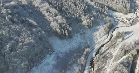 Drone Flight in a Cinematic Winter landscape at South Bavaria Stock Footage 227953741