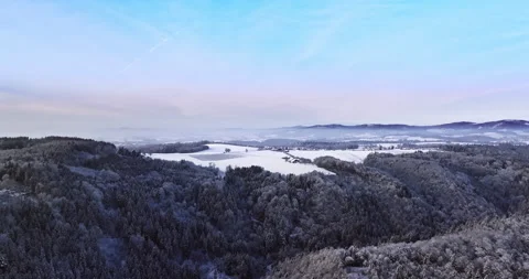 Drone Flight in a Cinematic Winter landscape at South Bavaria Stock Footage 227963222