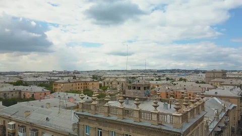 Drone flight circulating over near the old style house roof Stock Footage 94323810