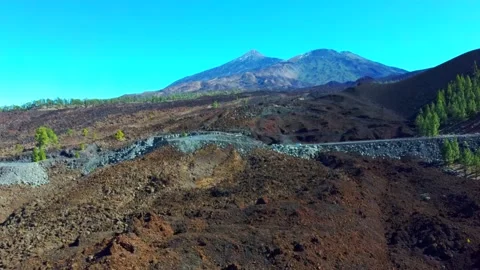 Drone flight close to the ground to the top of teide Stock Footage 138818516