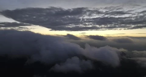 Drone flight in the clouds at sunset Stock Footage 327360505