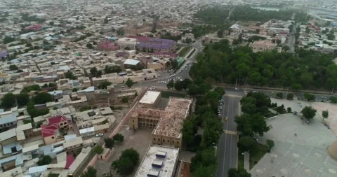 Drone flight at dawn over the old city in Bukhara Stock Footage 249159997