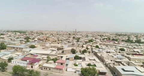 Drone flight at dawn over the old city in Bukhara Stock Footage 249436342