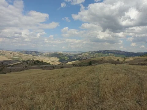 Drone Flight in fallow fields with a beautiful sky Stock Footage 72579280