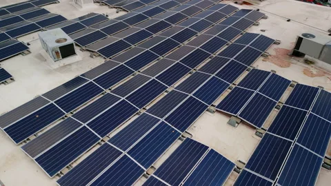 Drone flight fly over solar panels renewable green alternative energy on the Stock Footage 205149259