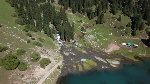 Drone Flight To Forest Camp By Alpine Lake. Kyrgyzstan, Suttuu-Bulak Lake Stock Footage 332943472