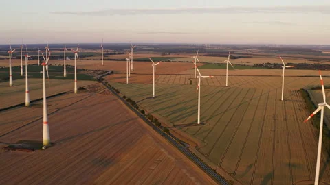 Drone flight from a great height downwards over a large field with many wind Stock Footage 163098327