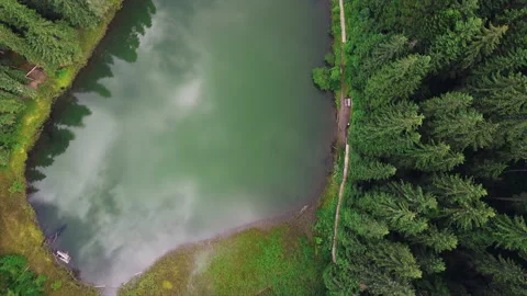 Drone flight high in the mountains above the lake. Stock Footage 151498182