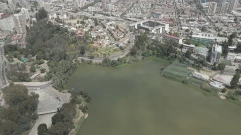Drone flight, horizontal panning over Sausalito lagoon and stadium access road Stock Footage 235948621