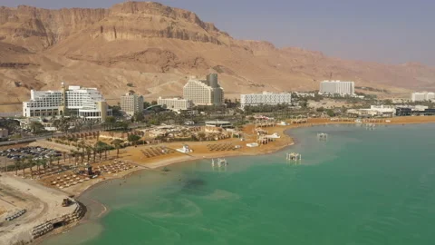 Drone flight hotels Ein Bokek beach, popular resort town on the Dead Sea Israel Stock Footage 168621736