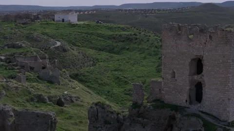 Drone flight leaving on one side the 9th century castle of Oreja on the Stock Footage 275153329