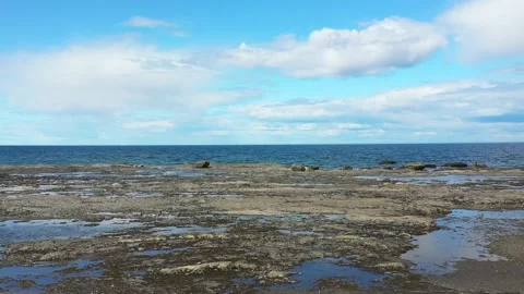 Drone flight at low altitude, at low tide near the St-Lawrence River at Ans.. Stock Footage 236334173