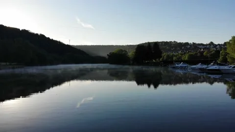 Drone flight low over river at sunrise with the fog. Videos 4K. Stock Footage 197020810