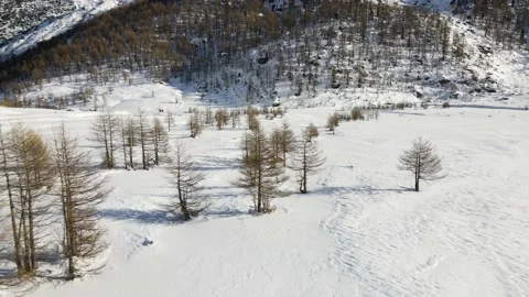 Drone flight in mountain landscape with snow. 4k Aerial video footage, Alps Stock Footage 148031372