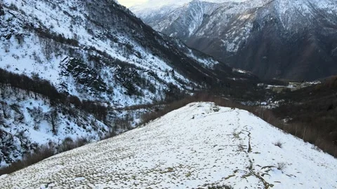 Drone flight in mountain landscape with snow. Alps, Italy. Aerial video footage. Stock Footage 148031470