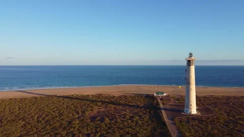 Drone flight next to lighthouse in Morro Jable, Fuerteventura, Spain Video stock 286360593