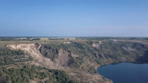 Drone flight over the abandoned quarry, natural landscape Stock Footage 96596555