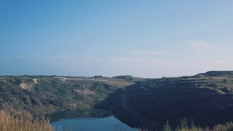 Drone flight over the abandoned quarry, natural landscape Stock Footage 96617762
