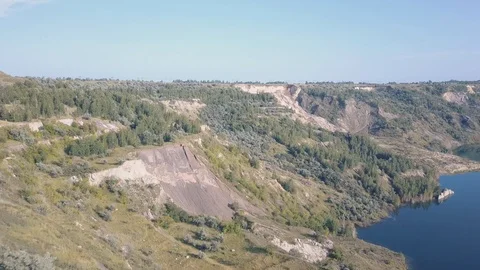 Drone flight over the abandoned quarry, natural landscape Video stock 96619155