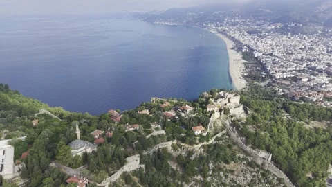 Drone Flight Over Alanya Castle and Historic Seljuk Shipyard with Mediterrane Stock Footage 340170161