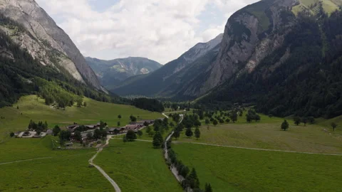 Drone Flight Over Alpine Farm and Meadow in Eng Alm Valley Austria Stock Footage 340485844