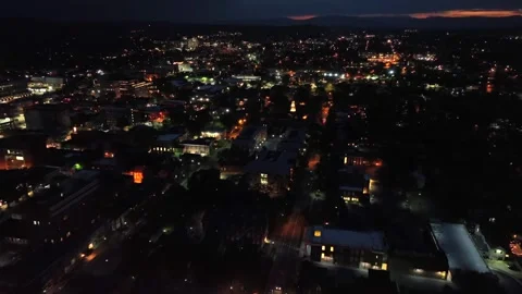 Drone flight over American town at night. Aerial Birds Eye shot. Peaceful Stock Footage 308198951
