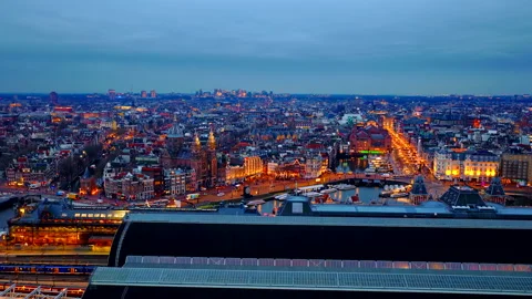 Drone Flight Over Amsterdam Centraal Station 4K Trains Ferries and City Centre Stock Footage 334154005