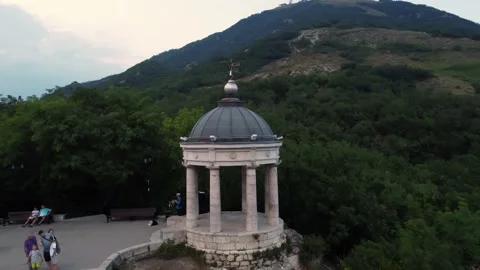 A drone flight over an ancient building at sunset in Pyatigorsk. The mountains Stock Footage 158817502