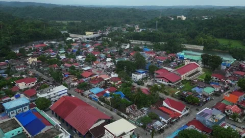 Drone flight over Andaya Park and the surrounding town center of Ragay 動画素材 345970175