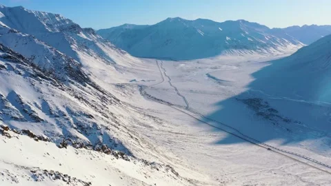 Drone Flight Over Atigun Valley Dalton Highway During Winter Vídeo Stock 134583122