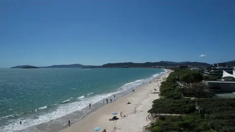 Drone flight over a beautiful beach in summer Stock Footage 229853718