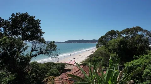 Drone flight over a beautiful beach in summer Stock Footage 229853727