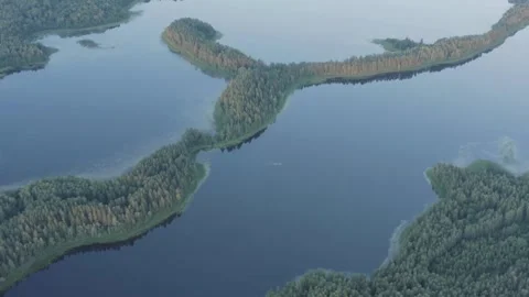 Drone flight over beautiful lake with many green islands Stock Footage 333830410