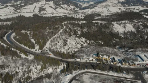 Drone flight over the beautiful landscape of the road in the mountains covered Stock Footage 149486037