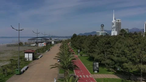 Drone flight over the bike path in the city of Batumi Stock Footage 152418106