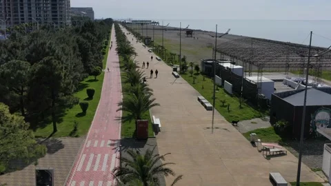 Drone flight over the bike path, aerial view of the embankment Stock Footage 152418555