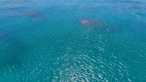 Drone flight over blue Caribbean sea. Blue water surface texture. Stock Footage 312232162