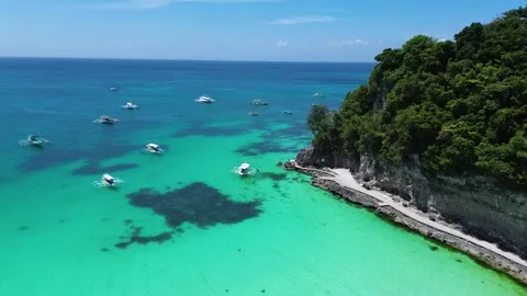 Drone flight over Boracay beach crystal clear water tropical island Philippi Stock Footage 333582413