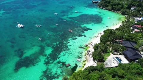 Drone flight over Boracay beach crystal clear water tropical island Philippi Stock Footage 333582414