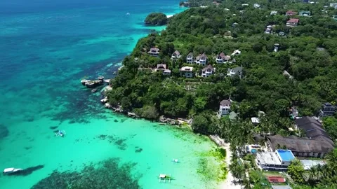 Drone flight over Boracay beach crystal clear water tropical island Philippi Stock Footage 333582427
