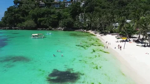 Drone flight over Boracay beach crystal clear water tropical island Philippi Stock Footage 333582430