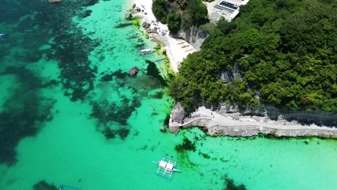 Drone flight over Boracay beach crystal clear water tropical island Philippi Stock Footage 333582433