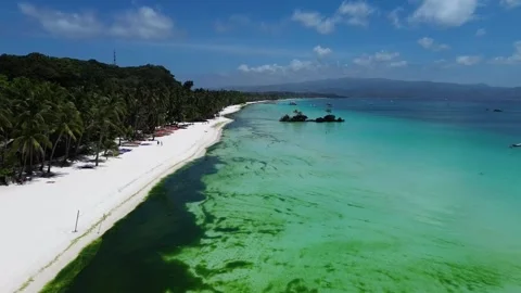 Drone flight over Boracay beach crystal clear water tropical island Philippi Stock Footage 333582438