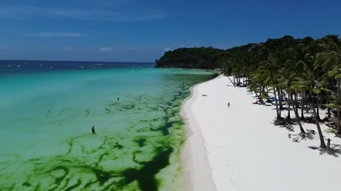 Drone flight over Boracay beach crystal clear water tropical island Philippi Stock Footage 333582440