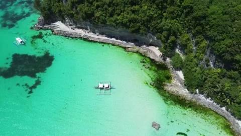 Drone flight over Boracay beach crystal clear water tropical island Philippi Stock Footage 333582447