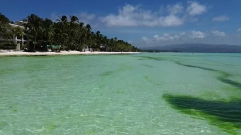 Drone flight over Boracay beach crystal clear water tropical island Philippi Stock Footage 333582457