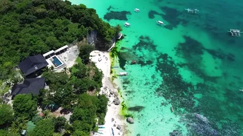 Drone flight over Boracay beach crystal clear water tropical island Philippi Stock Footage 333582464