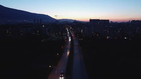 Drone flight over Boulevard Andrey Lyapchev in Sofia, Bulgaria at dusk Stock Footage 254724761