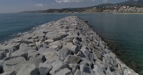 Drone flight over breakwater of nautical port in the Mediterranean Sea Stock Footage 88104962