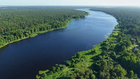 Drone Flight Over Bullupe River Waterway Near Riga Surrounded By Nature Stock Footage 341923018